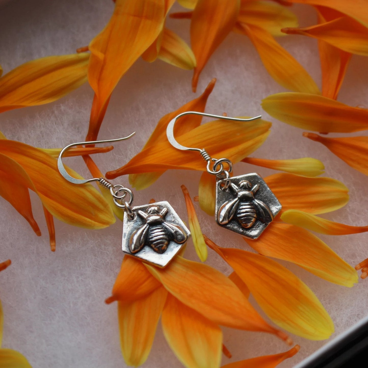 Pentagon bee earrings